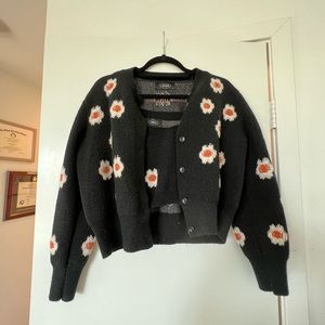 Black sweater with flowers